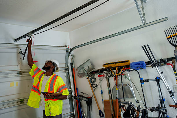 Professional Garage Door Panel Replacement technician working in Ogden Dunes, IN